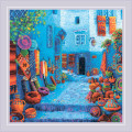 Colors of Morocco cross stitch kit showcasing a vibrant Moroccan market street with pottery and textiles